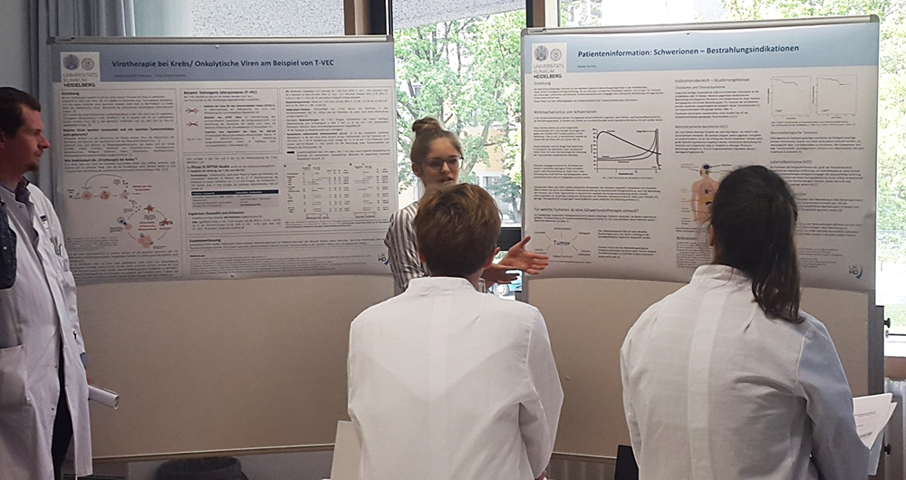 Students during a poster presentation